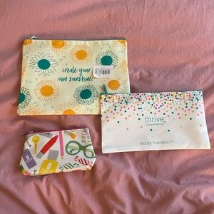 Set of 3 branded cosmetic bags